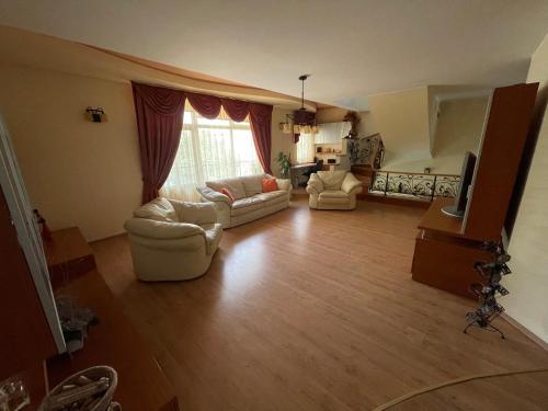 Et opholdsområde på NOVSEE INN Penthouse