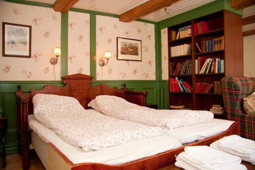 Säng eller sängar i ett rum på Garvaregården Hotel , B&B och Café