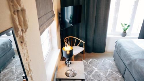 Μια τηλεόραση ή/και κέντρο ψυχαγωγίας στο Loft Hotel Rauma
