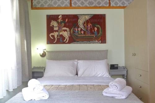 Postel nebo postele na pokoji v ubytování Casa della Fortuna