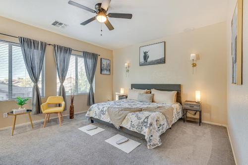 a bedroom with a bed and a ceiling fan at Family-Friendly Phoenix Home 5 Mi to Westgate! in Phoenix