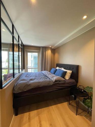 Un pat sau paturi într-o cameră la Scandpoint Apartment Exquisite & Homely Flat in Lillestrom Center Oslo with Parking