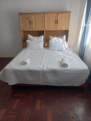 Postel nebo postele na pokoji v ubytování Triple T Guest house