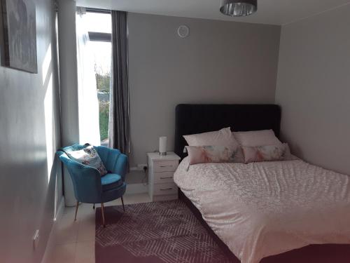 Postel nebo postele na pokoji v ubytování Haven Apartment