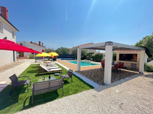 Ferienhaus mit privatem beheiztem Schwimmbad