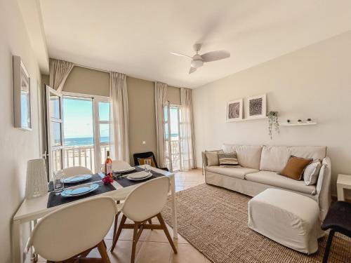 Ένα ή περισσότερα κρεβάτια σε δωμάτιο στο Papaya Apartments Boa Vista