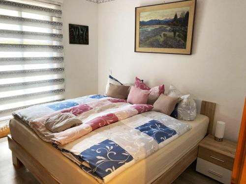 Postelja oz. postelje v sobi nastanitve Wohnung in Garmisch-Partenkirchen mit Kleinem Garten