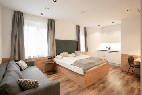 Postel nebo postele na pokoji v ubytování Feichter Hotel & Bistro
