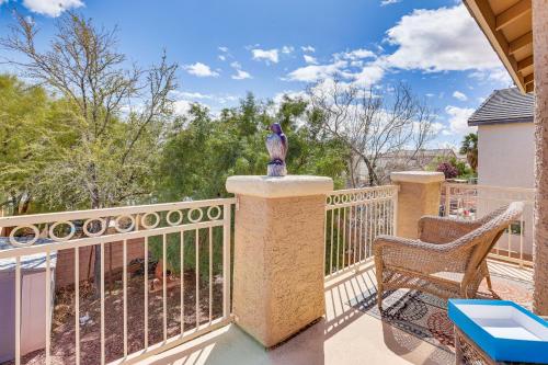 a balcony with a statue of a bird on a railing at Private Yard Las Vegas Sanctuary on Cul-De-Sac in Las Vegas