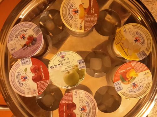a bunch of labels on a container of food at Valmarina in Calenzano