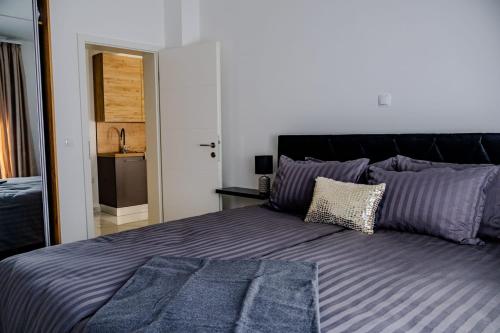 Postel nebo postele na pokoji v ubytování Stylish House Aurora