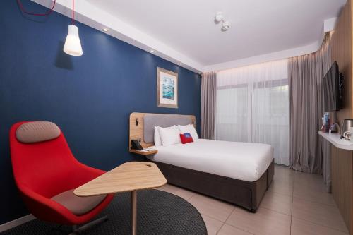 Ένα ή περισσότερα κρεβάτια σε δωμάτιο στο Holiday Inn Express - Malta by IHG
