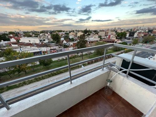 a balcony with a view of a city at Relax Haedo norte in Villa Sarmiento