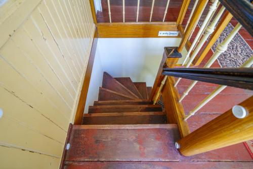 a wooden staircase with wooden treads and wooden railings at Alandblick in Wanzer