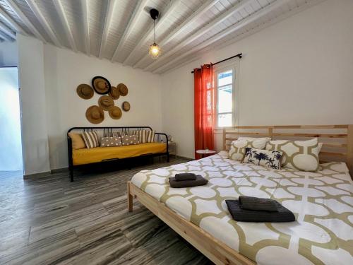 A bed or beds in a room at Beachside studio Ornos area