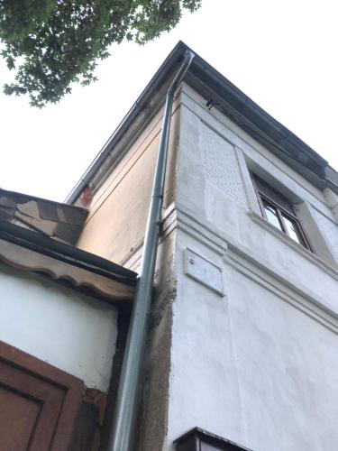 a pole on the side of a building at Blauer Stern Weipert in Chomutov