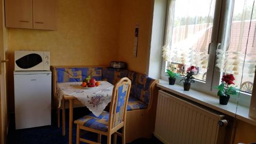 Kuchyň nebo kuchyňský kout v ubytování Ferienzimmer im Thüringer Wald nahe dem Rennsteig