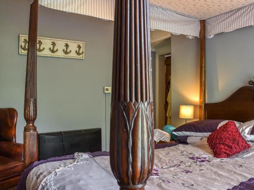 Ένα ή περισσότερα κρεβάτια σε δωμάτιο στο Hunters Lodge
