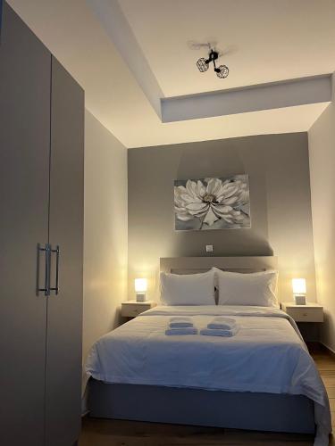 A bed or beds in a room at Paggaio Escape Apartments