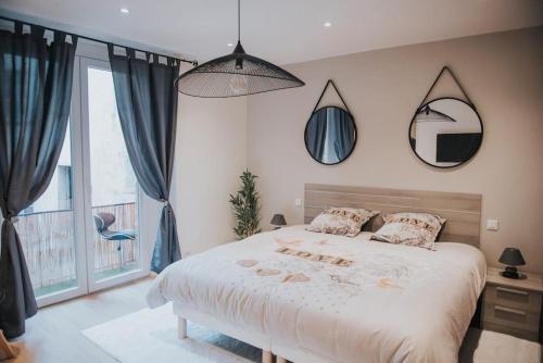 Postel nebo postele na pokoji v ubytování Splendide appartement Cosy