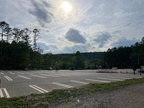 an empty parking lot with the sun in the sky at Nagano Forest Village (former name: Iizuna Kogen C - Vacation STAY 36544v in Nagano