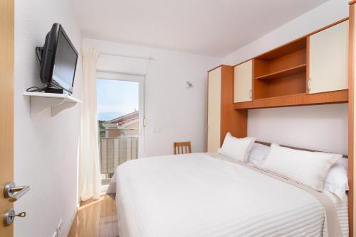 Postel nebo postele na pokoji v ubytování GOLDY GREEN