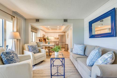 a living room with a couch and a table at Beachfront Panama City Condo with Balcony and Views! in Panama City