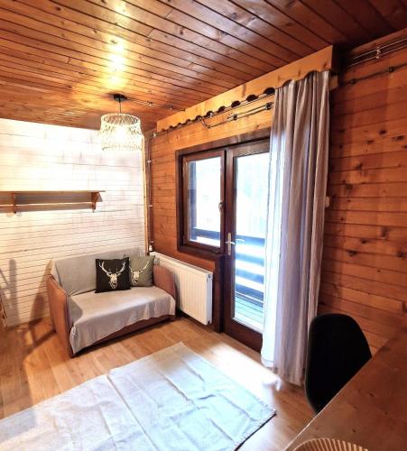 Кът за сядане в Forest Apartments Pokljuka