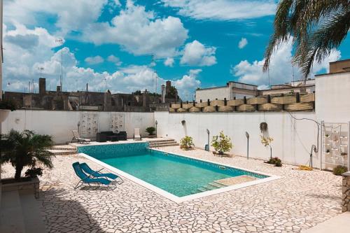 a swimming pool on the roof of a building at LA CASETTA 3.0 in Calimera