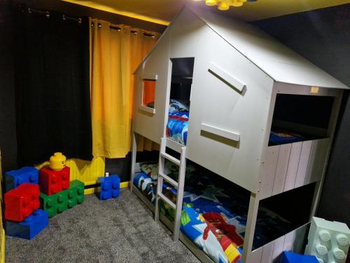 a toy bedroom with a bunk bed and a bunk bed at The Lego themed house in Windsor