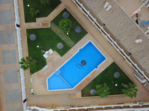 A view of the pool at Modern two bedroom apartment, 10 mins from beach or nearby