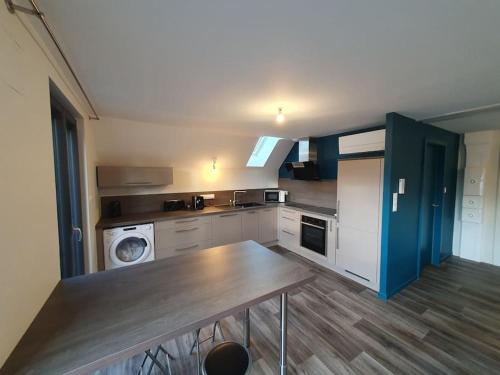 Kuchyň nebo kuchyňský kout v ubytování Appartement 2 pièces tout confort, Aux Portes de Colmar