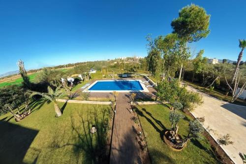 an overhead view of a yard with a swimming pool at Villa Meriem, Fès in Oulad Tayeb
