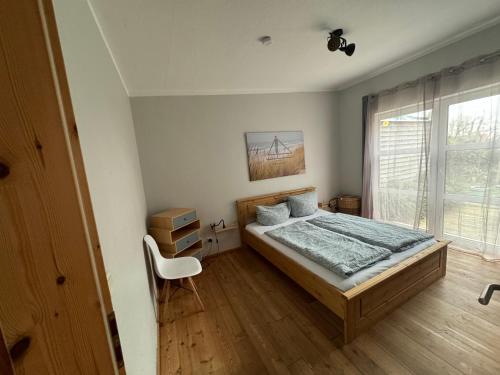 Ένα ή περισσότερα κρεβάτια σε δωμάτιο στο Apartment Sonne