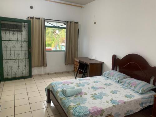Postel nebo postele na pokoji v ubytování Suíte com ar-condicionado (Família Hassan)