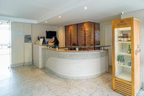 Лобби или стойка регистрации в Vip Praia Hotel
