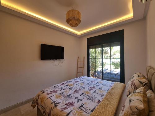 Katil atau katil-katil dalam bilik di La Perle de Marrakech by Atlas Golf Resort