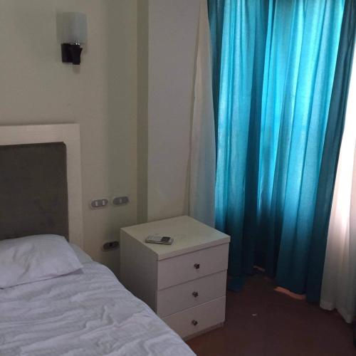 Katil atau katil-katil dalam bilik di Rental Apartment Sea View