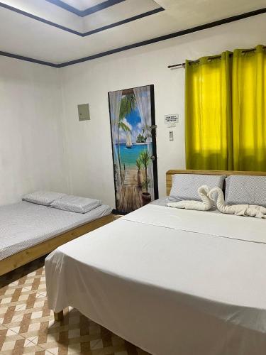Ένα ή περισσότερα κρεβάτια σε δωμάτιο στο Noah Xye Guest House