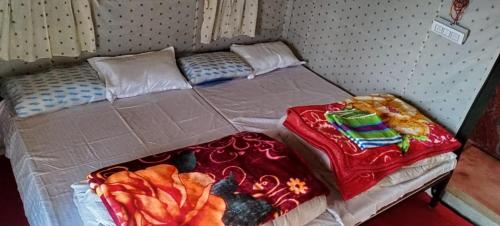 Postel nebo postele na pokoji v ubytování Camp Moonlight