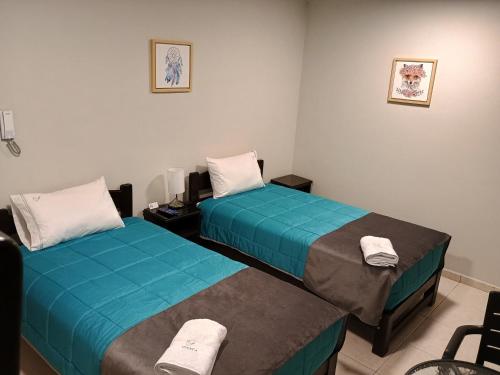 Postel nebo postele na pokoji v ubytování Vianca Hotel