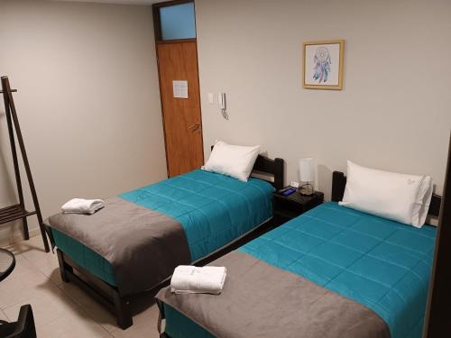 Postel nebo postele na pokoji v ubytování Vianca Hotel