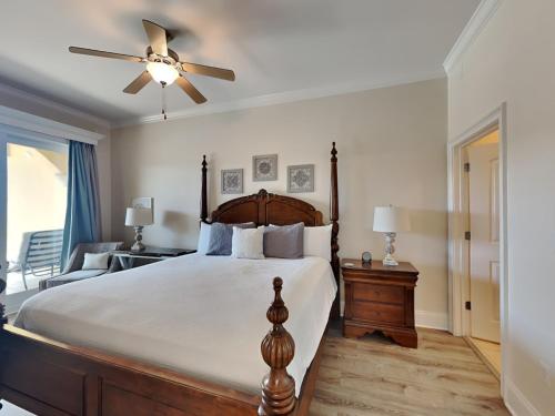 a bedroom with a bed and a ceiling fan at Adagio 301e in Santa Rosa Beach