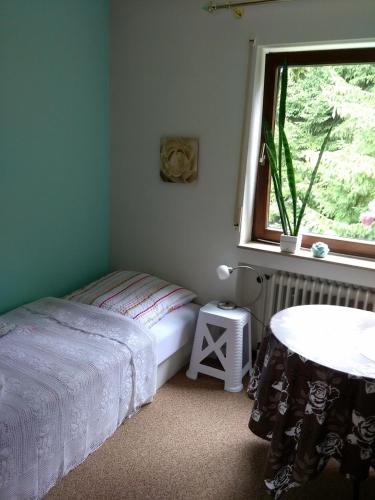 Postel nebo postele na pokoji v ubytování Tannhäuser b&b