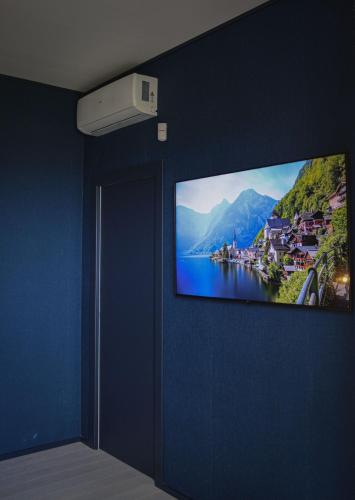 TV a/nebo společenská místnost v ubytování Appartamento Ferrucci di Via Gentile