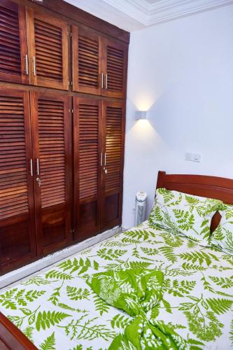 Ένα ή περισσότερα κρεβάτια σε δωμάτιο στο Éden garden luxurious guest house