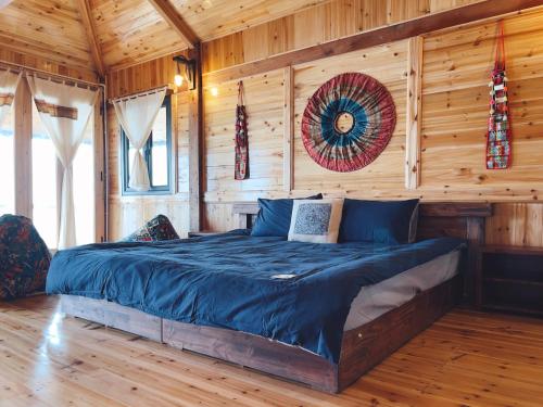 Postel nebo postele na pokoji v ubytování Ap Retreat - Ta Van's Heel