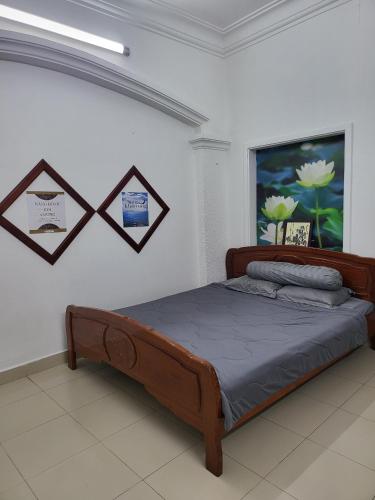 Postel nebo postele na pokoji v ubytování HOME TEA AN YEN