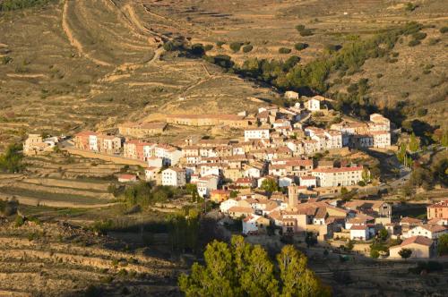 an aerial view of a village on a hill at Hostal de Montaña la Casa Grande in Nogueruelas