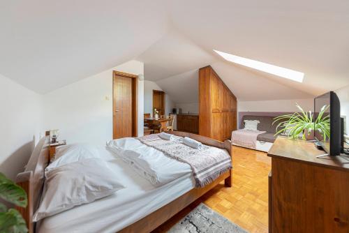 Postel nebo postele na pokoji v ubytování Bed and Breakfast Mili Vrh